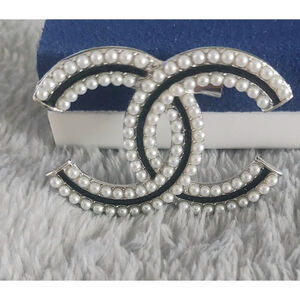 Double Faux pearls and Black Brooch. 2 inches